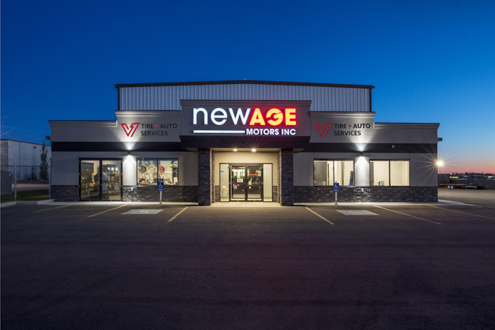 New Age Motors V1 building at night